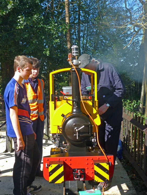 Pinewood junior members learing about firing up
